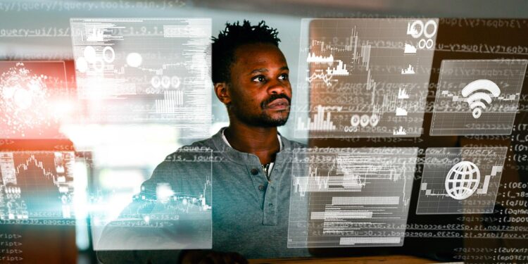 Man analysing multiple digital data dashboards and algorithms on transparent screens, illustrating how metrics and data systems shape human decision-making