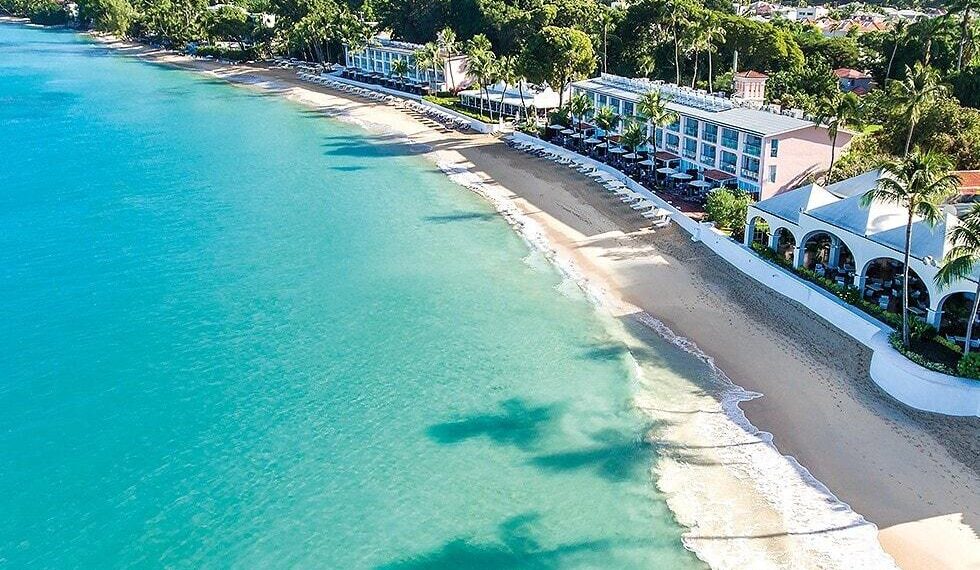 Luxury beachfront resort along Barbados’ Platinum Coast with turquoise waters and white sand shoreline