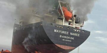 Cargo ship transporting oil through the Strait of Hormuz as global energy trade faces disruption from the Middle East crisis affecting Africa and Caribbean economies