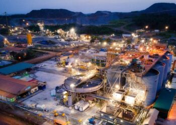 Damang gold mine processing plant in Ghana at dusk, showing industrial facilities and operations infrastructure