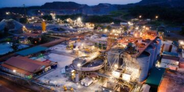 Damang gold mine processing plant in Ghana at dusk, showing industrial facilities and operations infrastructure