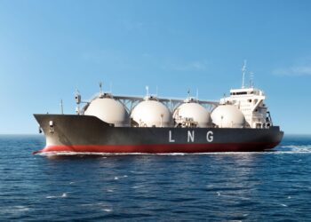 LNG carrier vessel with spherical storage tanks sailing on open sea