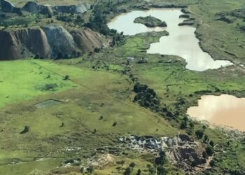 Aerial view of mining landscape in eastern Democratic Republic of Congo showing excavation sites and water pits linked to mineral exploration