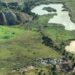 Aerial view of mining landscape in eastern Democratic Republic of Congo showing excavation sites and water pits linked to mineral exploration