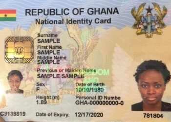 Ghana Card biometric national ID held in hand showing chip and personal details used for digital payments