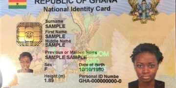 Ghana Card biometric national ID held in hand showing chip and personal details used for digital payments
