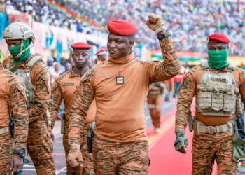 Burkina Faso soldiers in uniform led by military leader Ibrahim Traoré during a public event amid ongoing Sahel security crisis