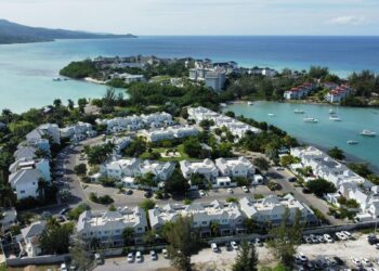 Aerial view of luxury coastal resorts and marina in Montego Bay, Jamaica, highlighting high-value tourism infrastructure and Caribbean coastline development.