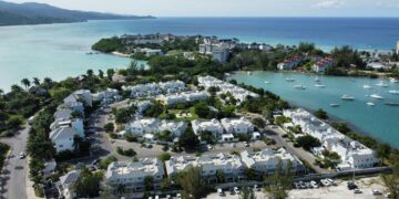 Aerial view of luxury coastal resorts and marina in Montego Bay, Jamaica, highlighting high-value tourism infrastructure and Caribbean coastline development.