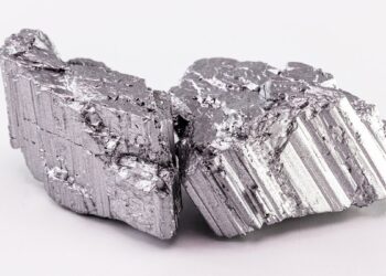 Close-up of rare earth metal sample used in electric vehicles and clean energy technologies