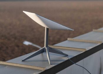 Starlink satellite internet dish installed outdoors in a rural setting, representing satellite broadband expansion in Africa