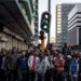 African migrants stand in Johannesburg’s central business district during tensions over immigration in South Africa