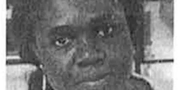 Annabella Gyasi, the Ghanaian woman whose detention at Washington Dulles International Airport became the subject of a federal court case, looks towards the camera in a close-up portrait