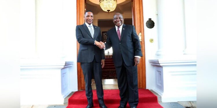 Botswana President Duma Boko shakes hands with South African President Cyril Ramaphosa in Gaborone