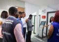 WHO and IOM officials inspect a health screening and surveillance facility during Ghana’s Ebola preparedness exercise