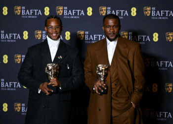 Nigerian filmmakers Akinola Davies Jr. and Wale Davies pose with BAFTA awards at the EE BAFTA Film Awards, highlighting Nollywood’s growing international recognition