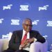 Aliko Dangote speaking on stage at the World Economy Summit in Nairobi against a Semafor and PwC-branded backdrop