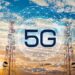 5G telecom towers and digital network graphic illustrating Ghana’s transition to a competitive nationwide 5G rollout