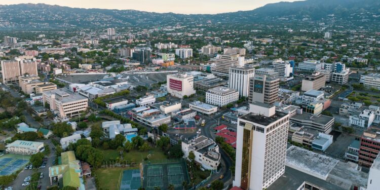 Aerial view of Kingston, Jamaica’s business district with office buildings, commercial centres and surrounding hills