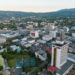 Aerial view of Kingston, Jamaica’s business district with office buildings, commercial centres and surrounding hills