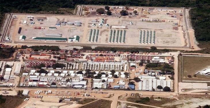 Aerial view of the Afungi LNG construction site in Cabo Delgado, Mozambique, showing industrial infrastructure, worker camps and processing facilities linked to the Mozambique LNG project
