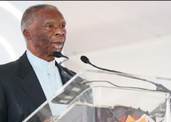 Former South African president Thabo Mbeki delivers remarks at a podium during a high-level policy event in Cape Town