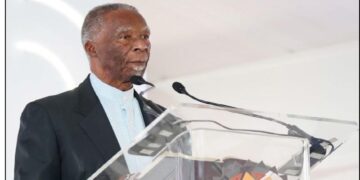 Former South African president Thabo Mbeki delivers remarks at a podium during a high-level policy event in Cape Town