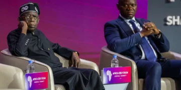 Nigerian President Bola Ahmed Tinubu and Gabonese President Brice Oligui Nguema participate in a panel discussion during the Africa CEO Forum in Kigali, Rwanda