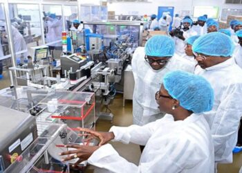 African scientists working in a pharmaceutical manufacturing facility as Africa expands local production of medicines and vaccines
