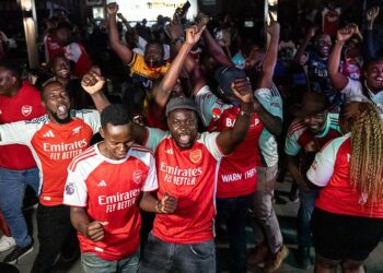 Arsenal supporters celebrate the club's Premier League title victory in Nairobi, Kenya, after President William Ruto invited the English champions to visit the country