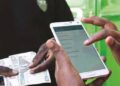 Kenyan and Nigerian consumers use mobile payment applications as Africa seeks to improve cross-border payment interoperability and digital trade integration