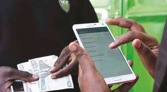 Kenyan and Nigerian consumers use mobile payment applications as Africa seeks to improve cross-border payment interoperability and digital trade integration
