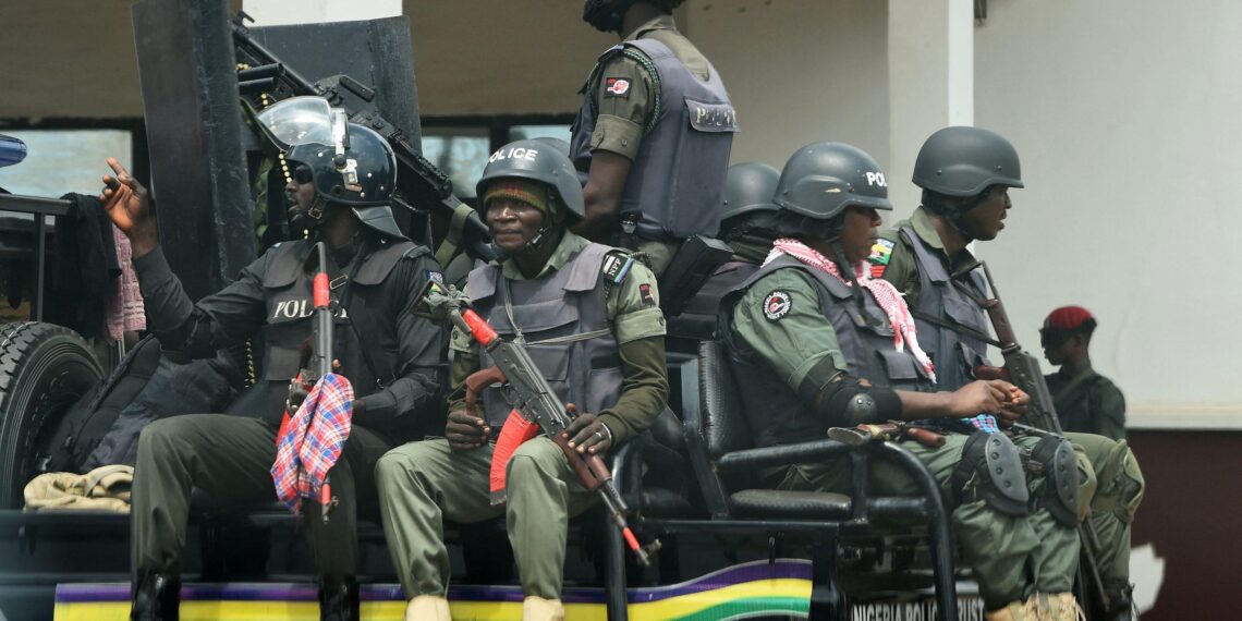 Nigerian police officers during a security operation as authorities crack down on the spread of misinformation linked to a school kidnapping case