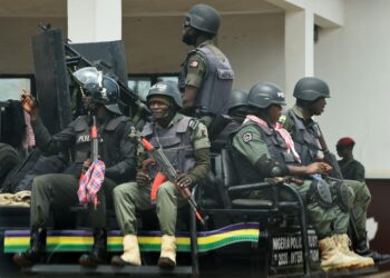 Nigerian police officers during a security operation as authorities crack down on the spread of misinformation linked to a school kidnapping case