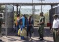 South African immigration officials carrying out border and document checks during an enforcement operation