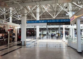 Passengers walk through Addis Ababa Bole International Airport in Ethiopia