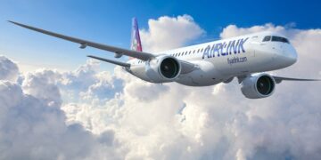 Airlink Embraer E195-E2 regional jet flying above clouds