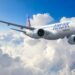 Airlink Embraer E195-E2 regional jet flying above clouds