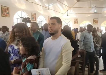 Dutch fugitive Jos Leijdekkers attending a church service in Tihun, Sierra Leone