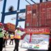 South African official beside an AfCFTA export container at Durban port
