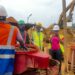 Small-scale mining trainees observe mercury-free gold-processing equipment at a mine site in Ghana’s Western Region