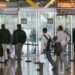 Passport control signs and traveller lanes at Madrid-Barajas Airport in Spain