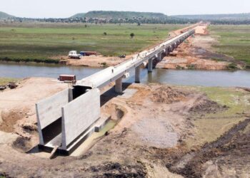 Concrete railway bridge under construction across the Malagarasi River in Kigoma Region, Tanzania